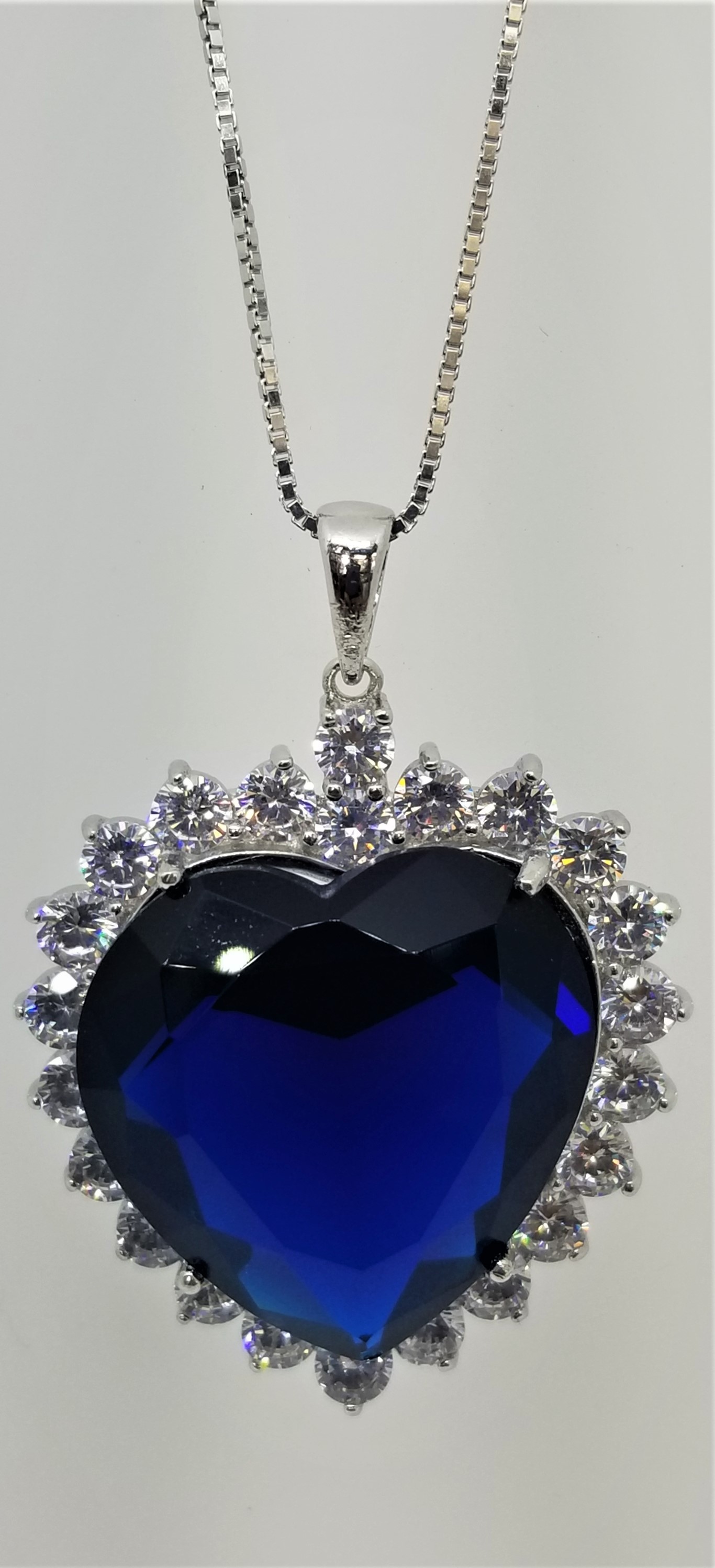 925 Sterling Silver Heart Pendant With Sapphire Blue Topaz And CZ