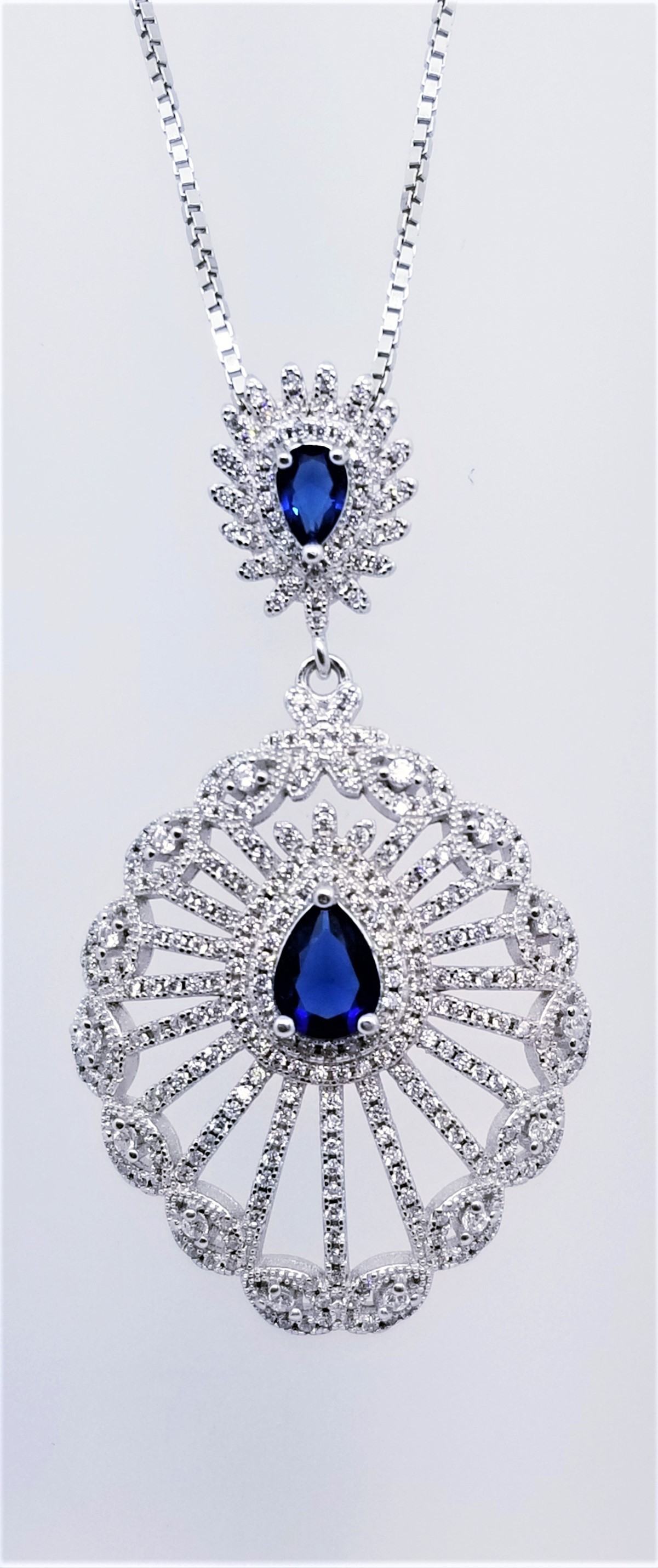 925 Sterling Silver Rhodium Tone Pendant With Sapphire And CZ Stones