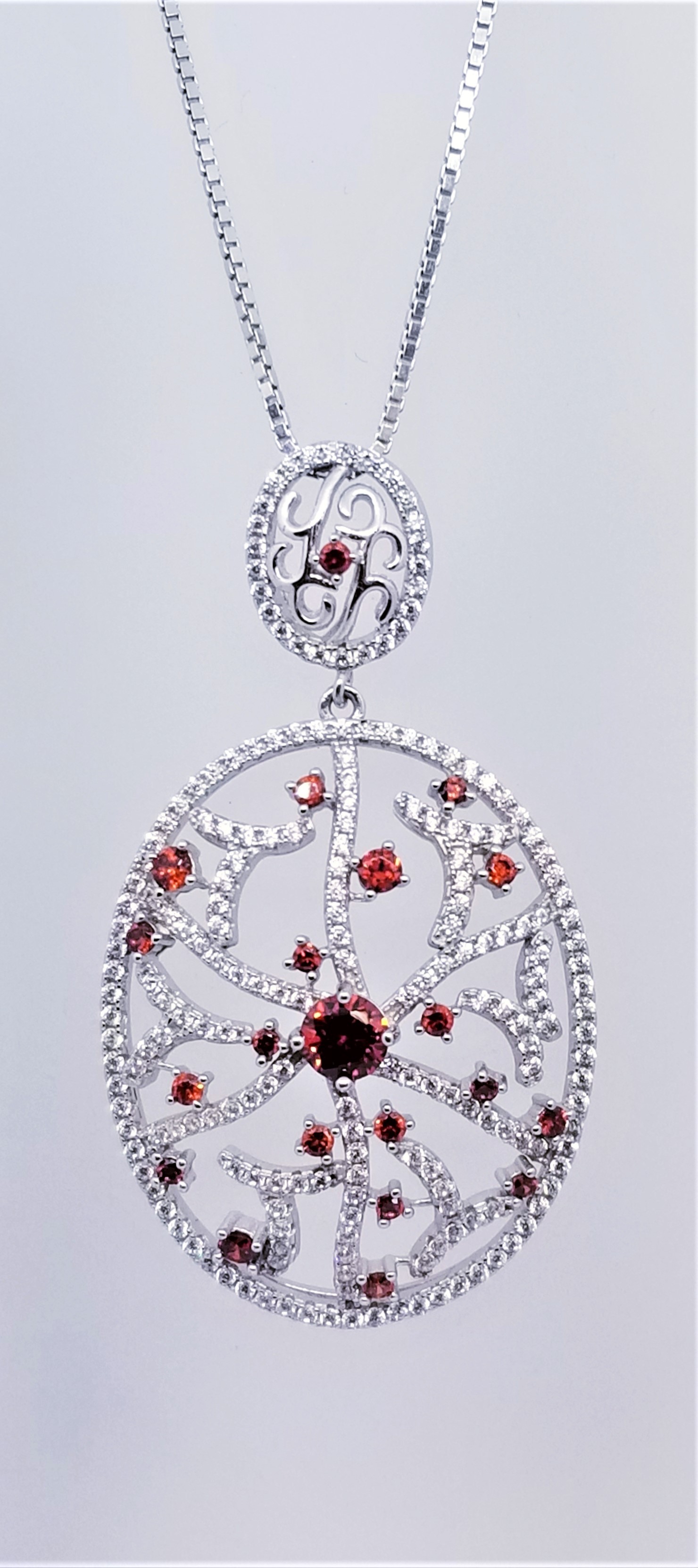 925 Sterling Silver Rhodium Tone Pendant With CZ And Garnet Stones