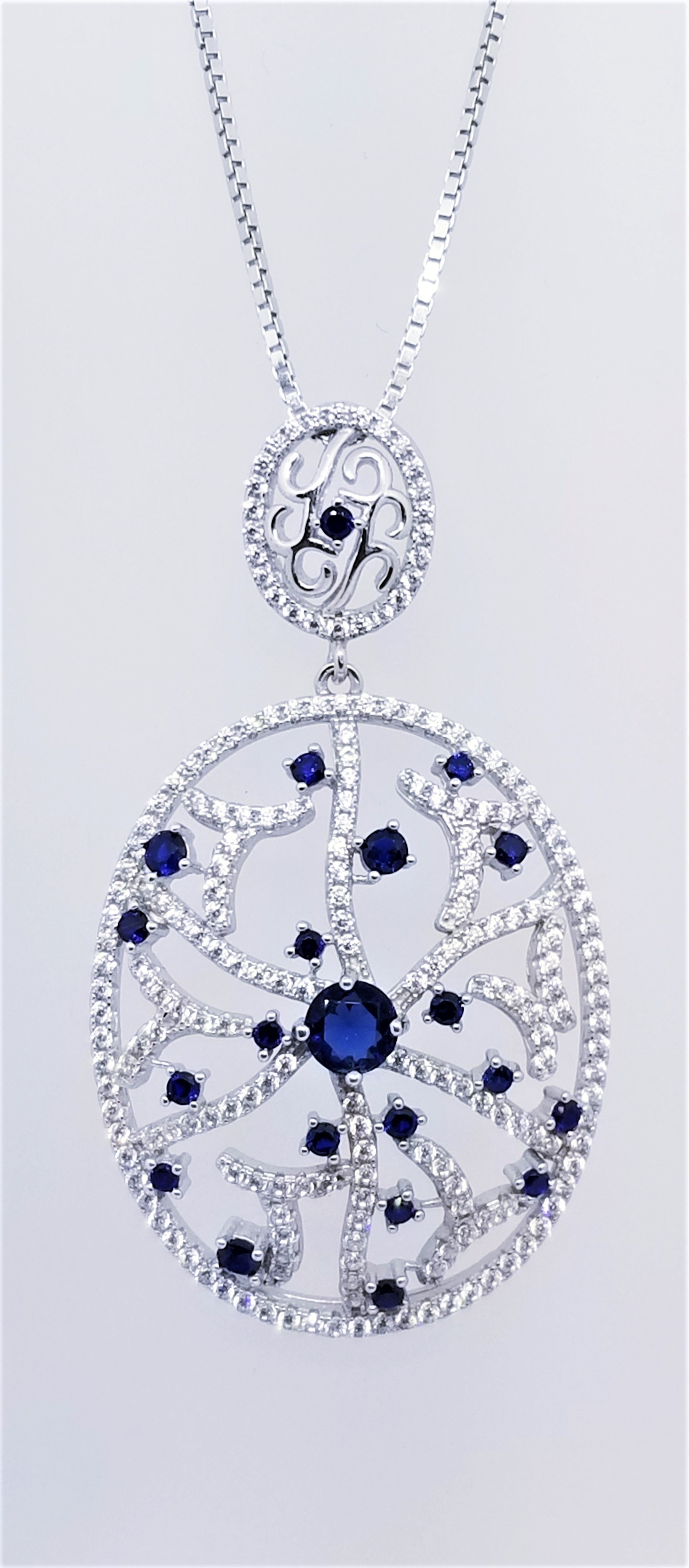 925 Sterling Silver Rhodium Tone Pendant With CZ And Sapphire Stones